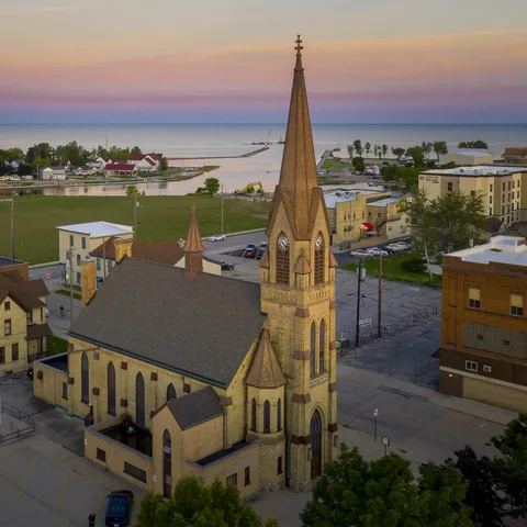 Aerial view of the church with water on the horizon